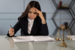 stressed lawyer at desk